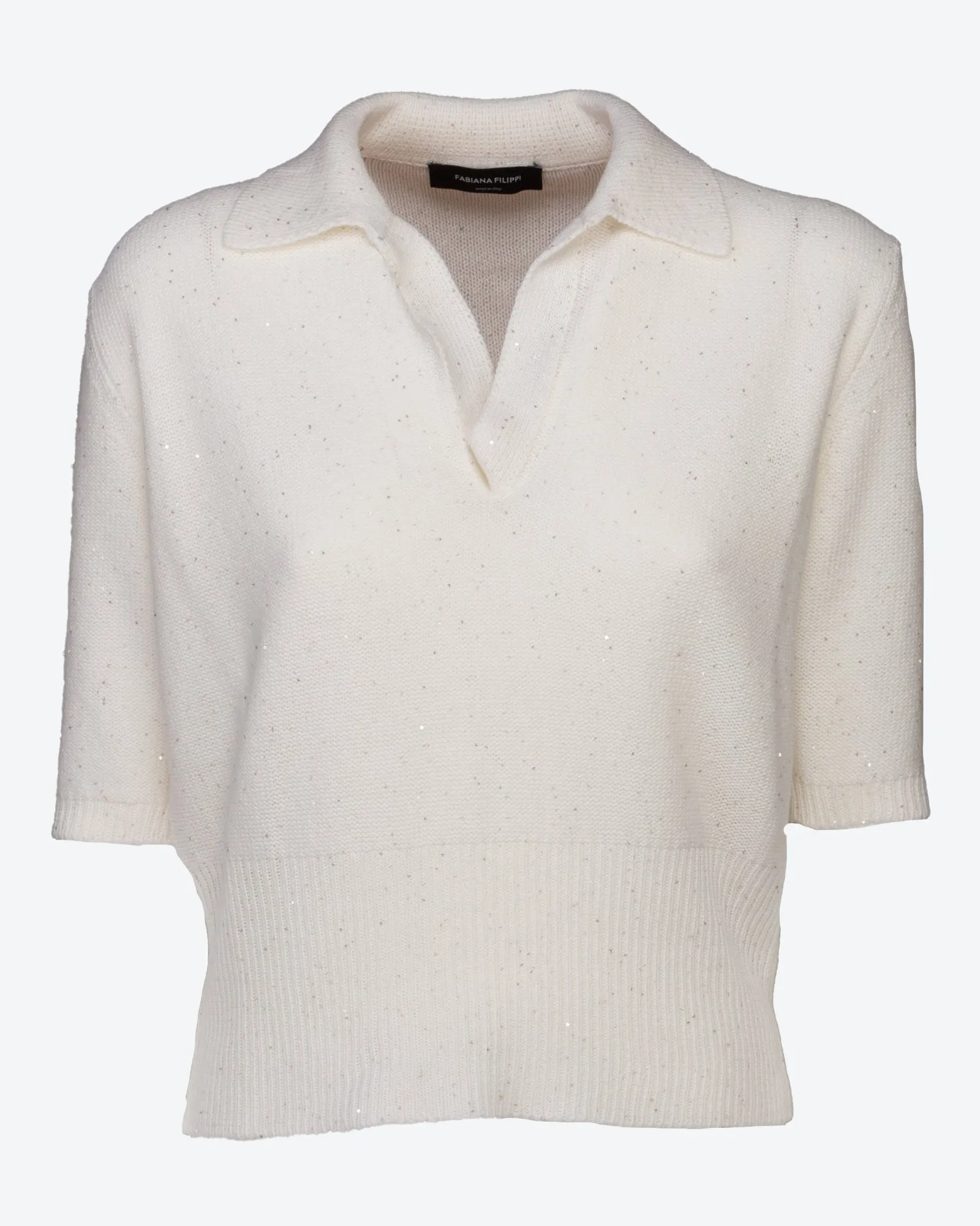 Polo con paillettes