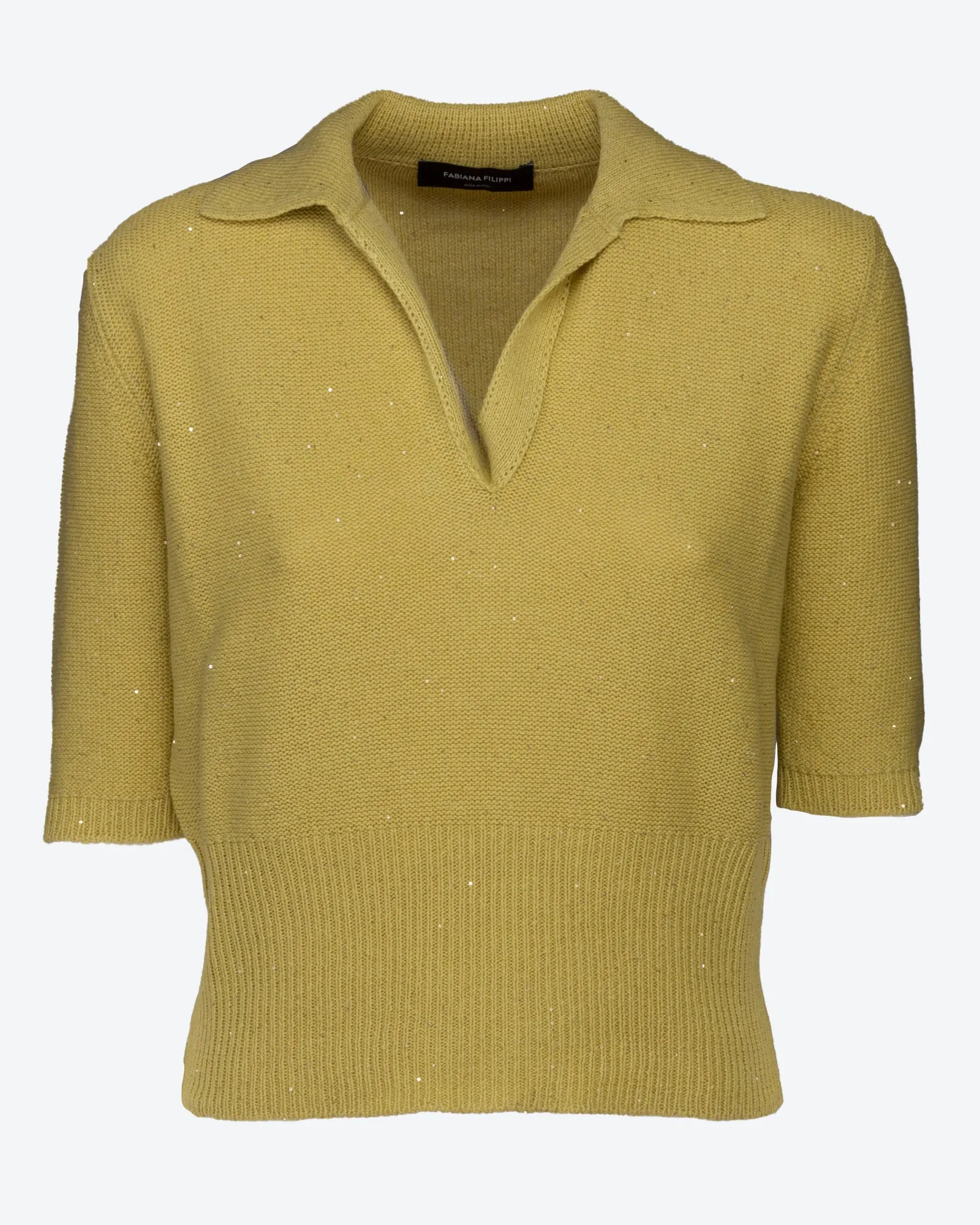 Polo con paillettes